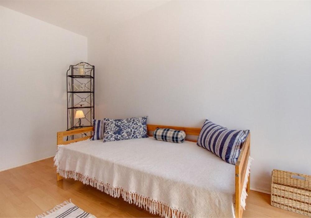 Postel nebo postele na pokoji v ubytování Apartments Jelena