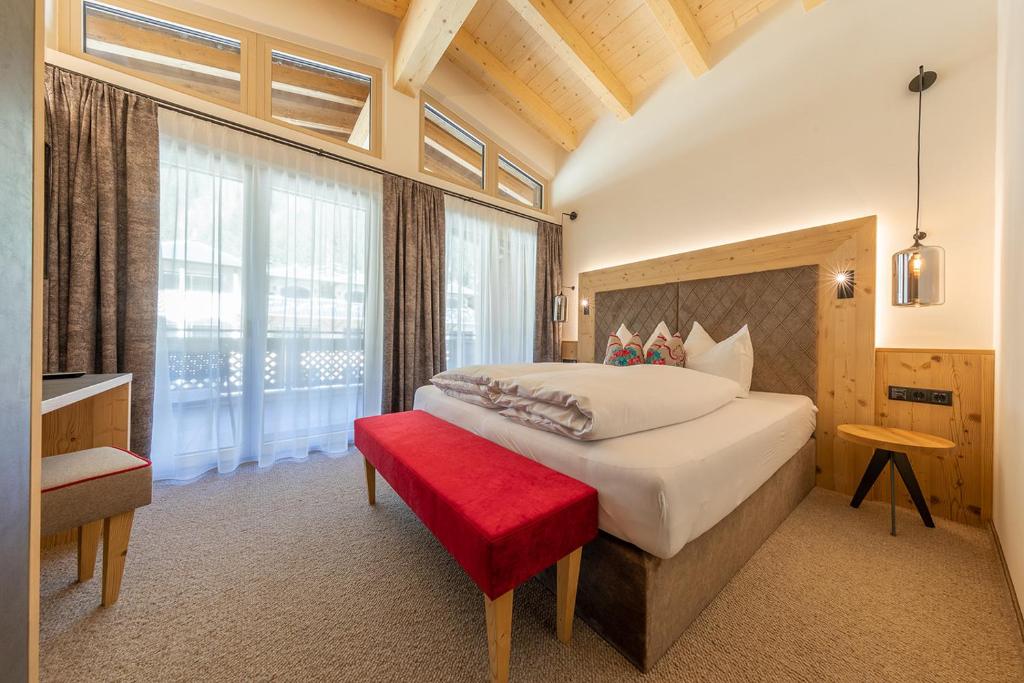 Postel nebo postele na pokoji v ubytování Apartments Edenlehen