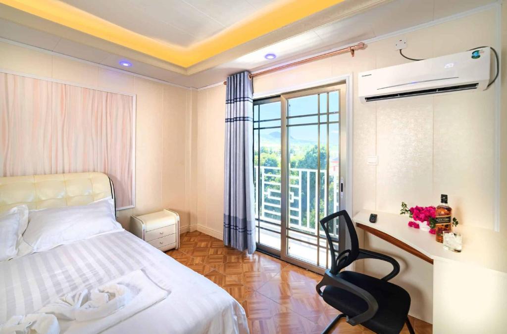 Postel nebo postele na pokoji v ubytování Riverside Hotel