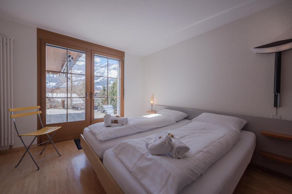 Postel nebo postele na pokoji v ubytování Chalet Alpenrebe