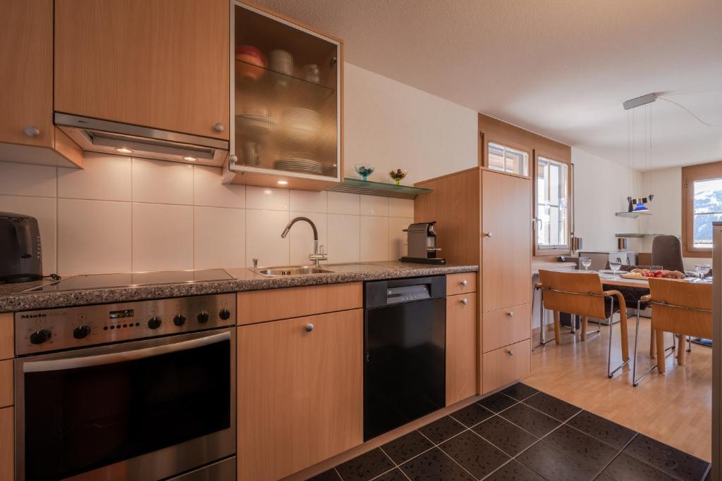 Kuchyň nebo kuchyňský kout v ubytování Chalet Alpenrebe
