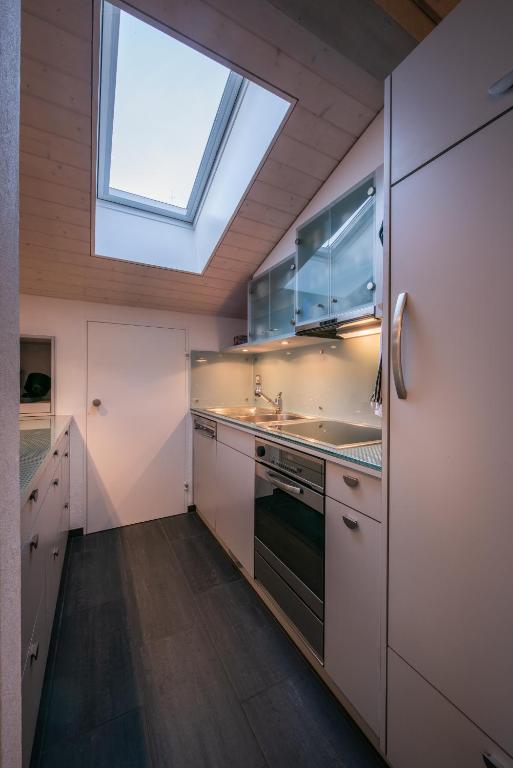 Kuchyň nebo kuchyňský kout v ubytování Chalet Primula Penthouse