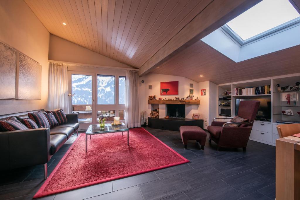 Posezení v ubytování Chalet Primula Penthouse
