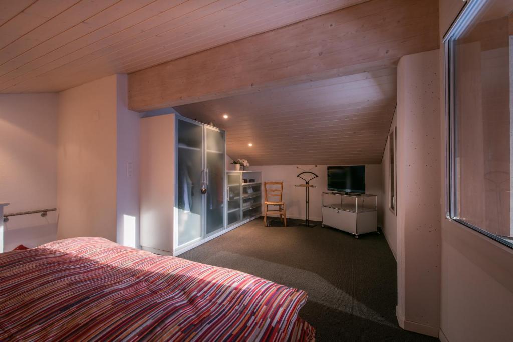 Postel nebo postele na pokoji v ubytování Chalet Primula Penthouse