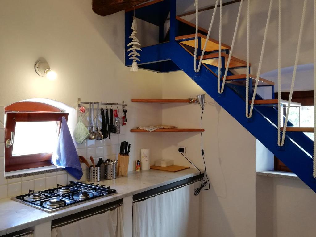 Kuchyň nebo kuchyňský kout v ubytování Rosa dei Venti