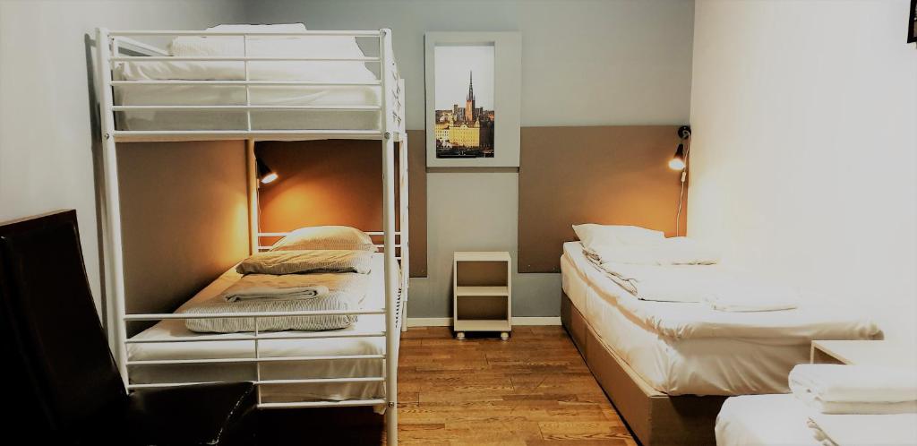 Postel nebo postele na pokoji v ubytování Mosebacke Hostel