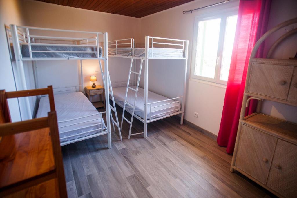 Postel nebo postele na pokoji v ubytování Résidence Padro