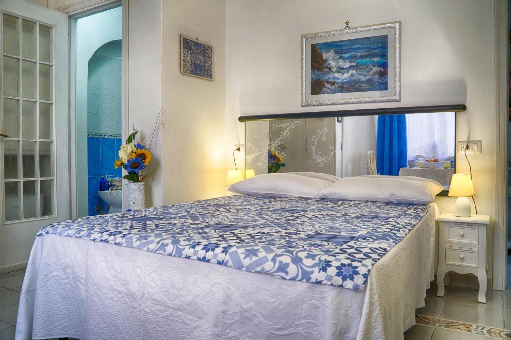 Postel nebo postele na pokoji v ubytování B&B Il Bacio di Capri