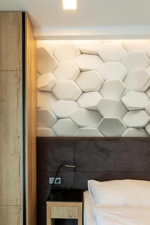 Postel nebo postele na pokoji v ubytování 4 SMART HOTEL