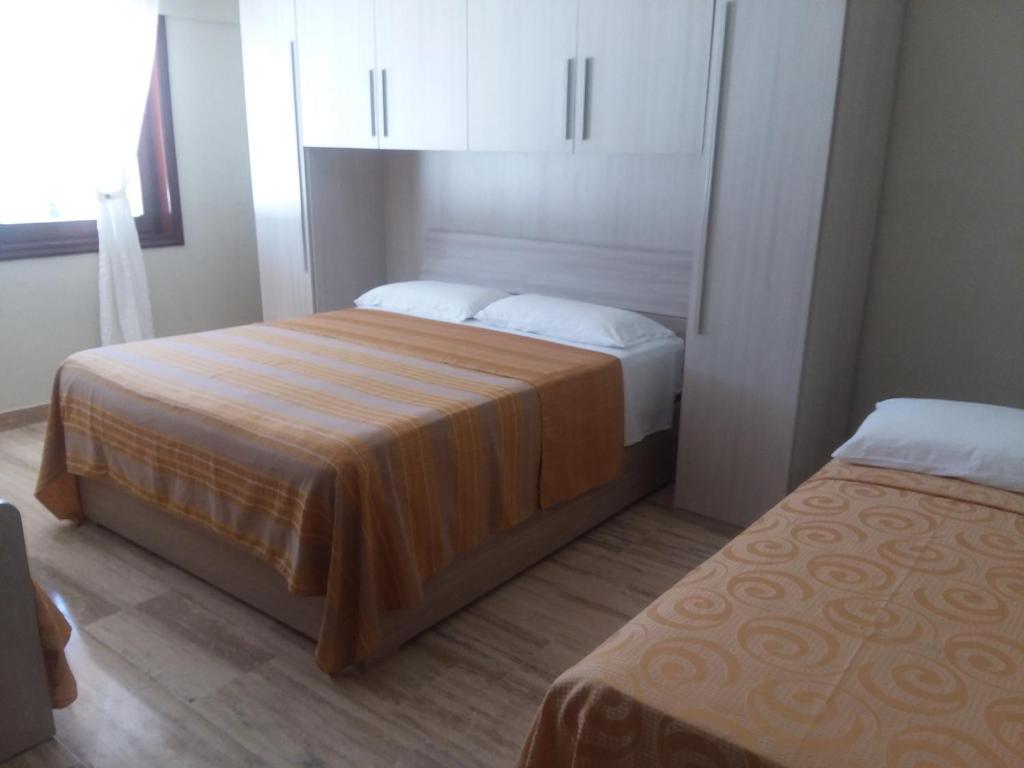 Postel nebo postele na pokoji v ubytování Oasi Encantada - Beach Resort