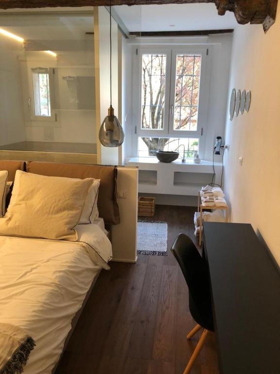 Letto o letti in una camera di Un Piccolo Rifugio a pochi passi dal duomo