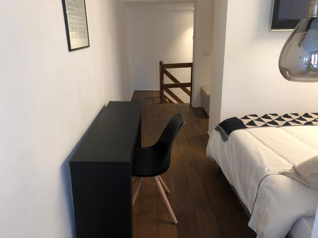 Letto o letti in una camera di Un Piccolo Rifugio a pochi passi dal duomo