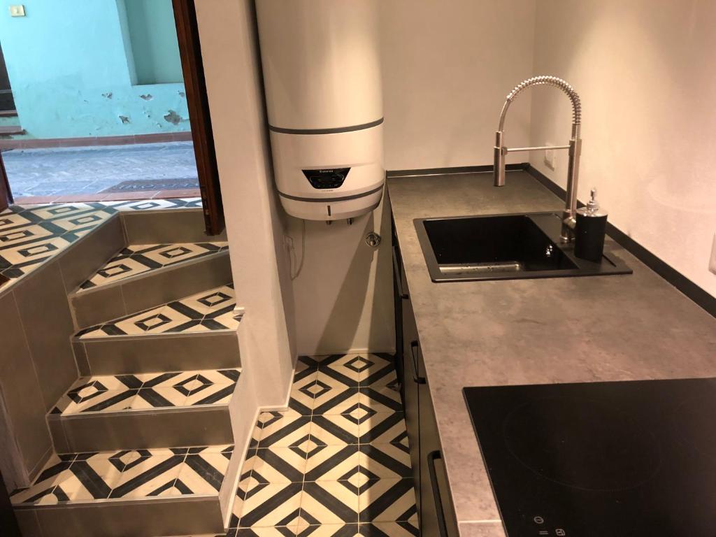 Cucina o angolo cottura di Un Piccolo Rifugio a pochi passi dal duomo