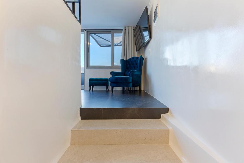 Posedenie v ubytovaní Athenian Lofts