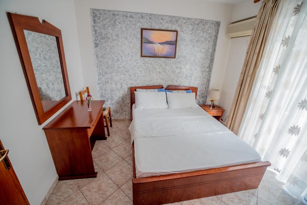 Postel nebo postele na pokoji v ubytování Hotel Klironomi