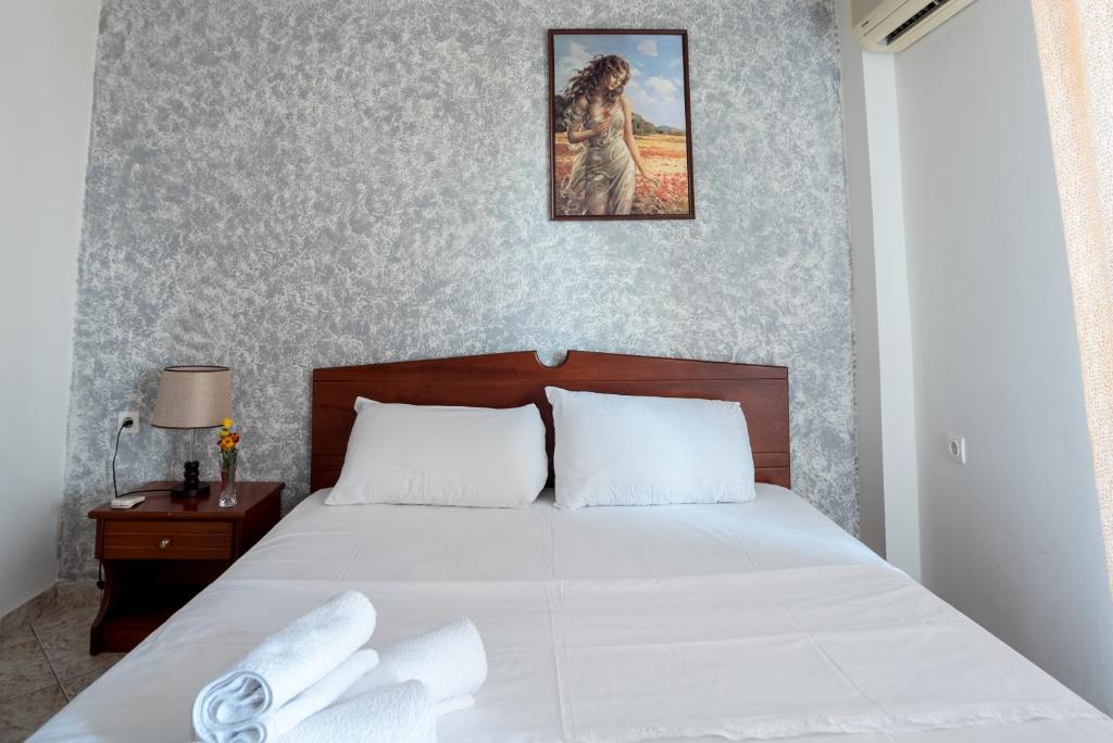 Postel nebo postele na pokoji v ubytování Hotel Klironomi