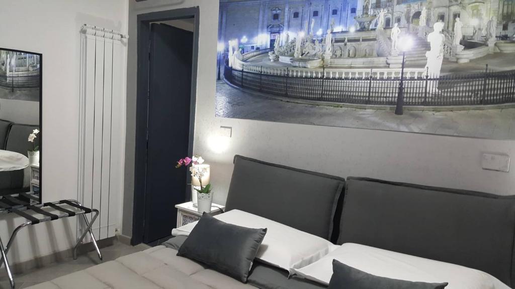 Una cama o camas en una habitación de ALBA DEL CAPO