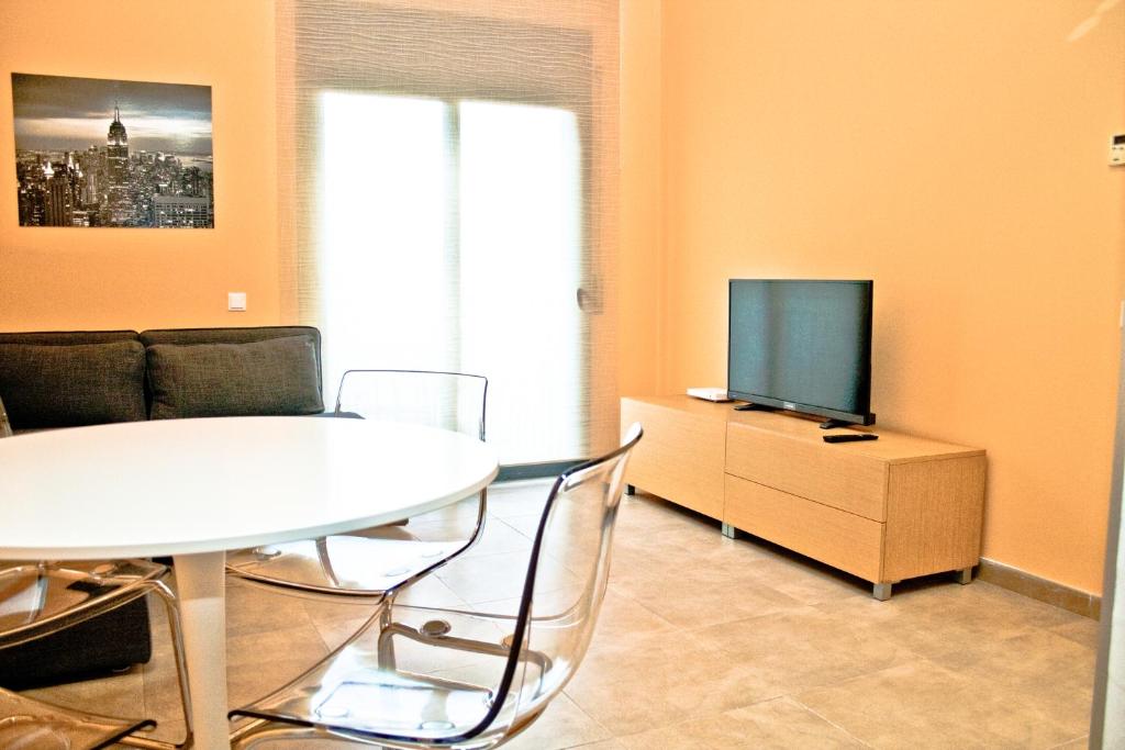 TV a/nebo společenská místnost v ubytování Urban Manresa-City center apartment with balcony