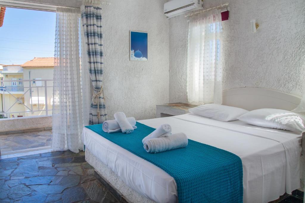 Posteľ alebo postele v izbe v ubytovaní Phoenix Beachside Condos