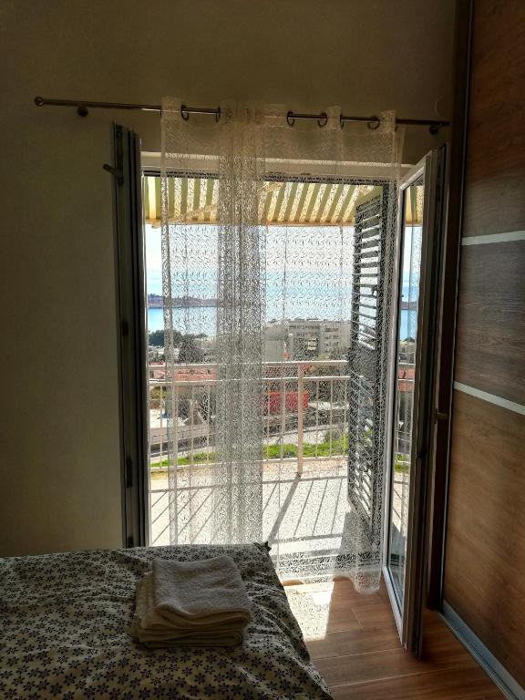 Postel nebo postele na pokoji v ubytování Apartments Villa Ravlić