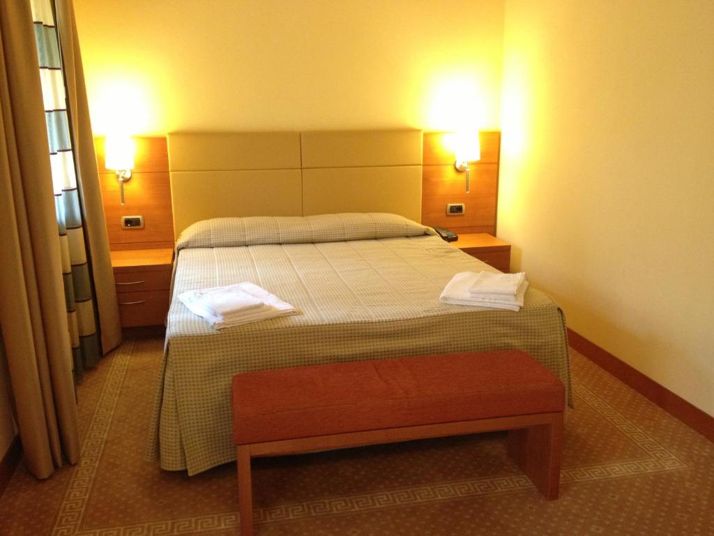 Postel nebo postele na pokoji v ubytování Relais San Giusto