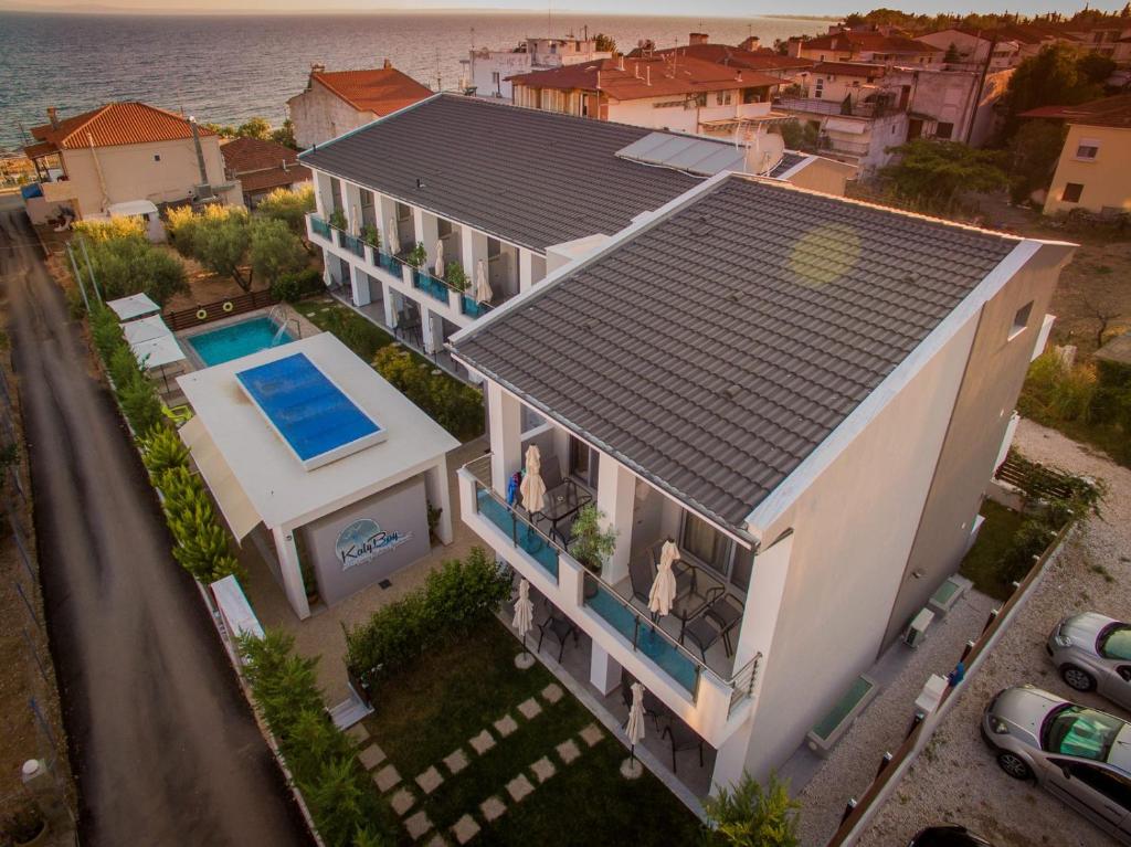 an aerial view of a house with a swimming pool at KalyBay in Kalivia Poligirou