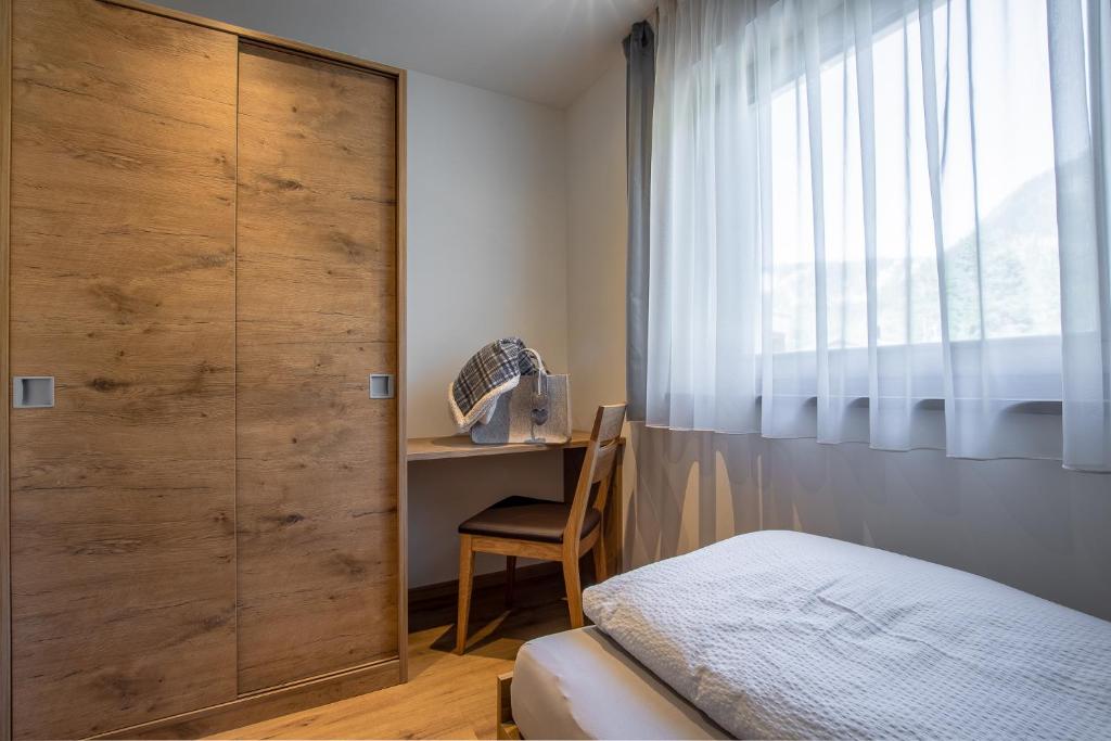 Posteľ alebo postele v izbe v ubytovaní Chalet Morin