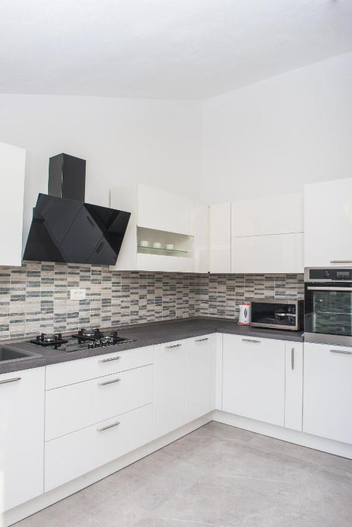 Kuchyň nebo kuchyňský kout v ubytování Apartman Franko