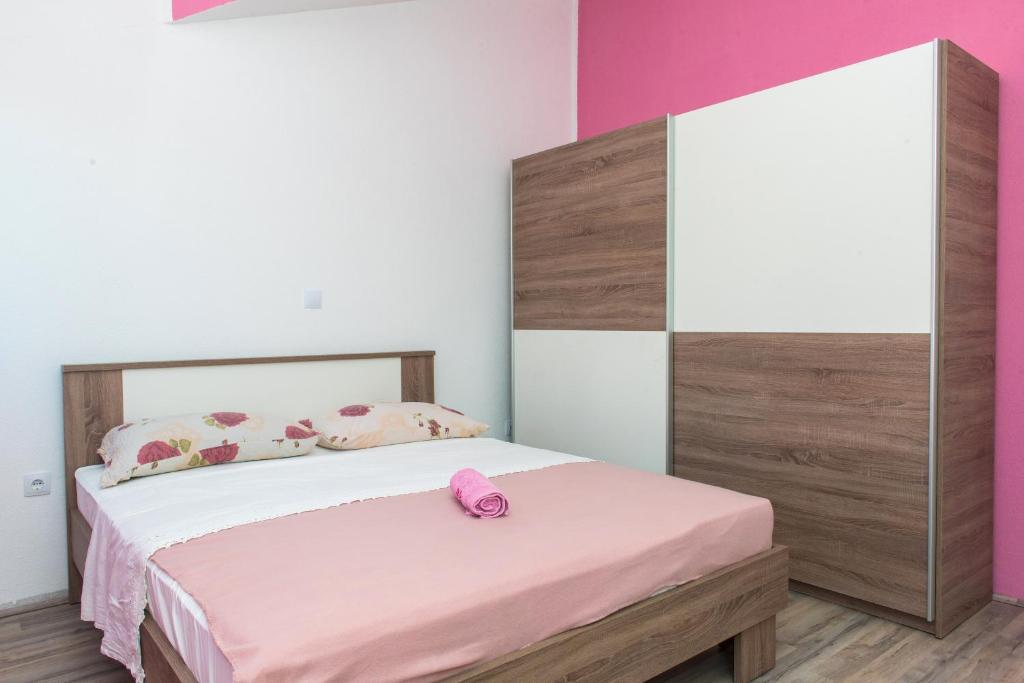 Postel nebo postele na pokoji v ubytování Apartman Franko