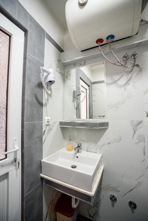 Koupelna v ubytování Hotel Klironomi