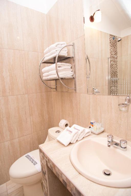 Koupelna v ubytování Hotel Arcangel