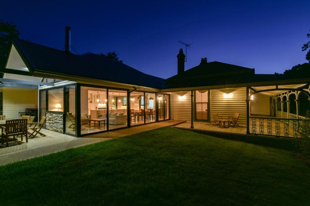 an external view of a house at night at Elm Tree Lodge Beechworth in Beechworth