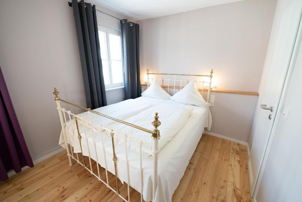 Postel nebo postele na pokoji v ubytování Hotel Alexander