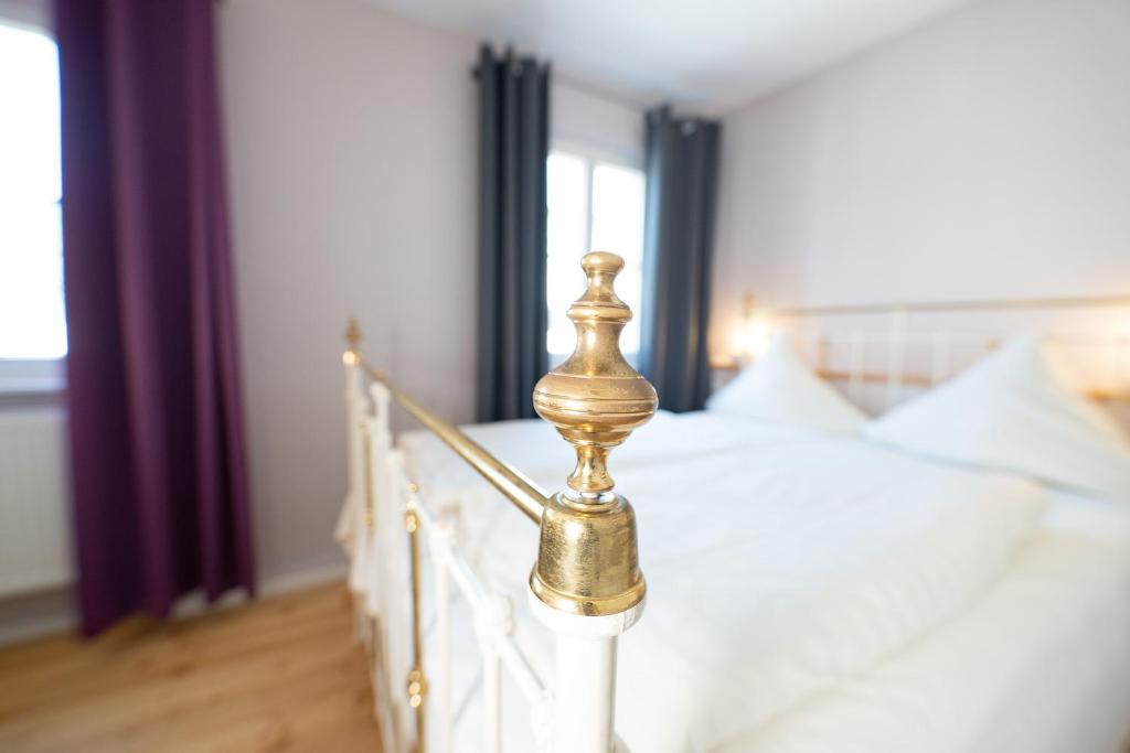Postel nebo postele na pokoji v ubytování Hotel Alexander