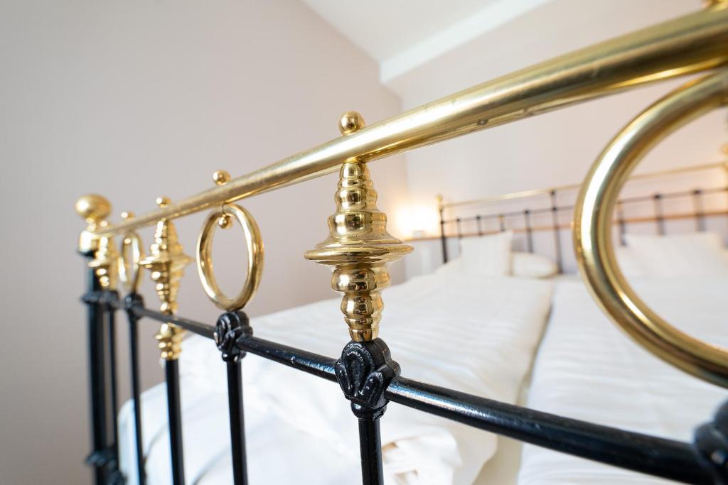 Postel nebo postele na pokoji v ubytování Hotel Alexander