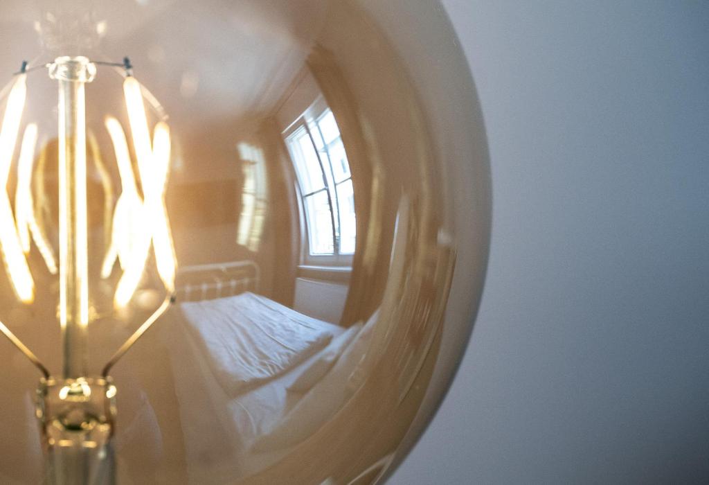 Postel nebo postele na pokoji v ubytování Hotel Alexander