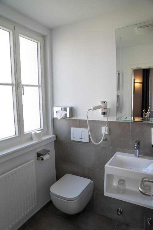 Koupelna v ubytování Hotel Alexander