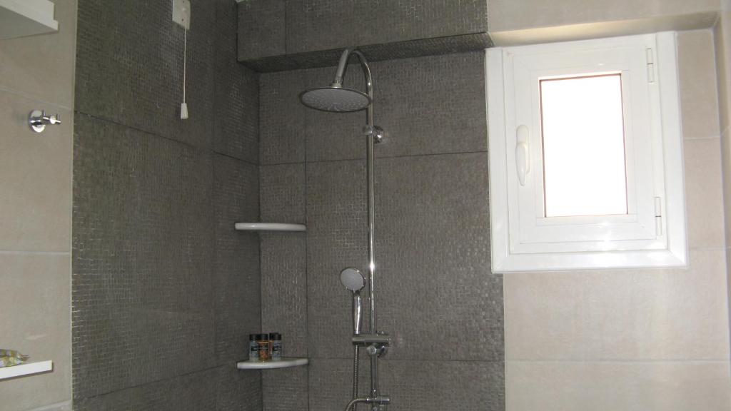 Kúpeľňa v ubytovaní Studios Maniati
