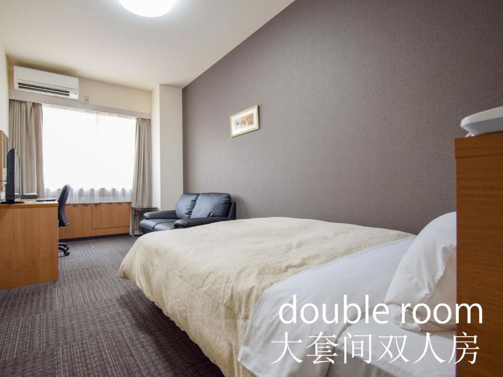 Postel nebo postele na pokoji v ubytování Hotel Maira