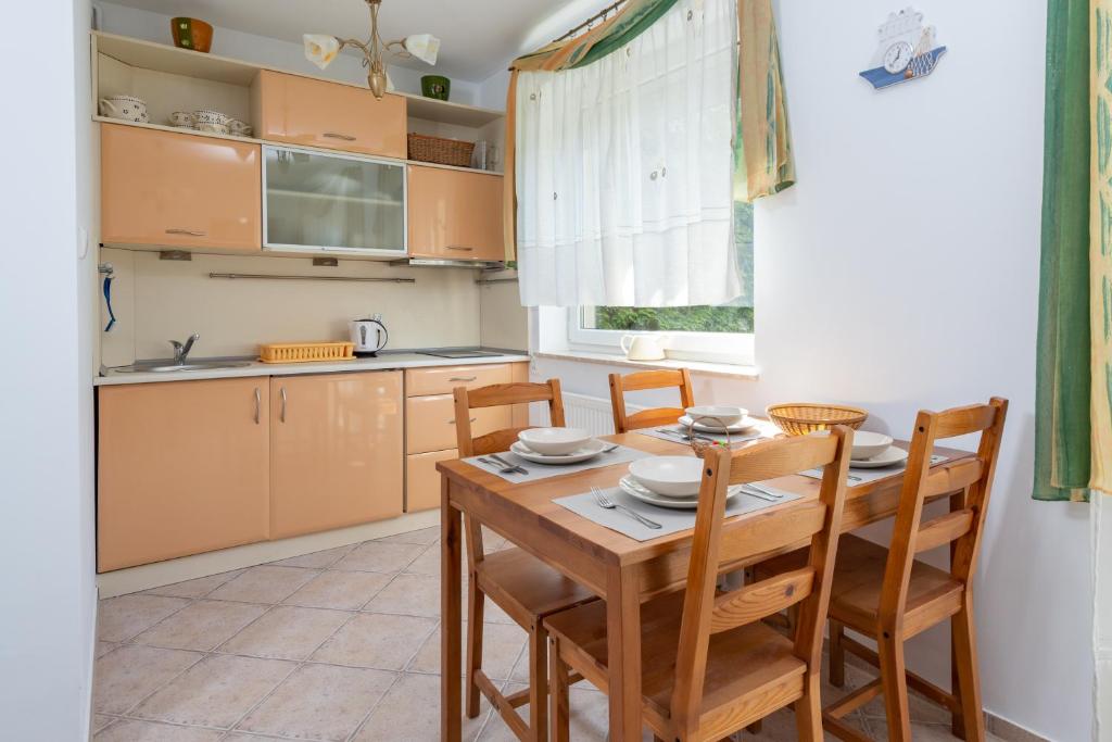 Kuchyňa alebo kuchynka v ubytovaní Apartamenty Jasna