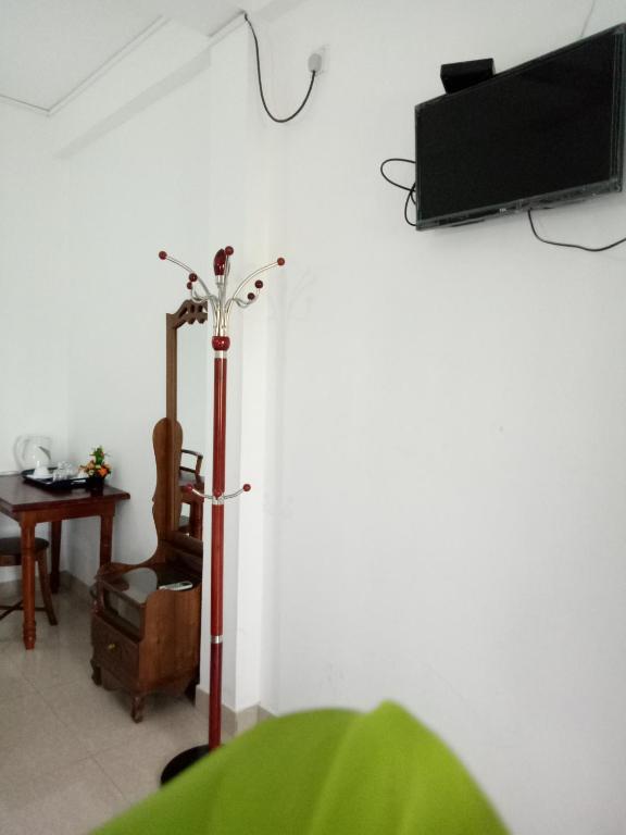 TV a/nebo společenská místnost v ubytování Otha Shy Airport Transit Hotel