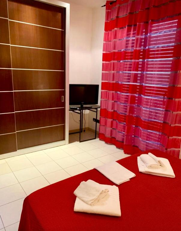 Posteľ alebo postele v izbe v ubytovaní Residence Domus