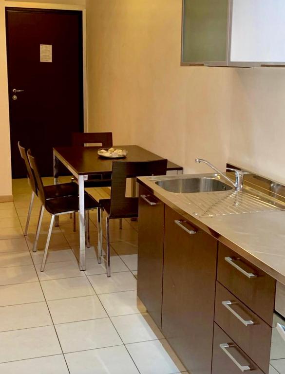 Kuchyňa alebo kuchynka v ubytovaní Residence Domus