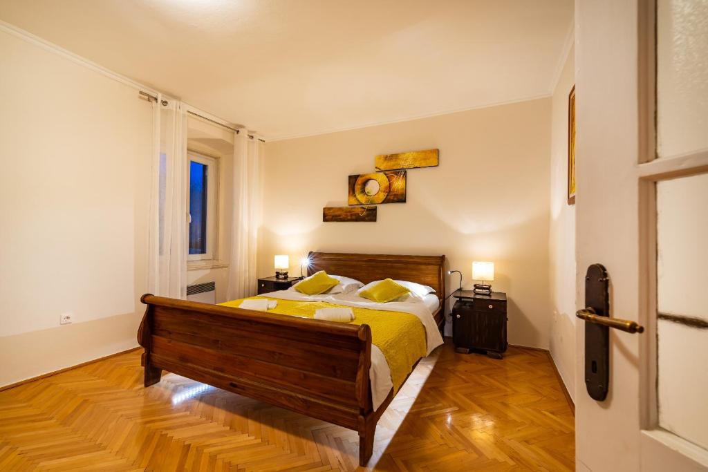 Postel nebo postele na pokoji v ubytování Apartment Caesar