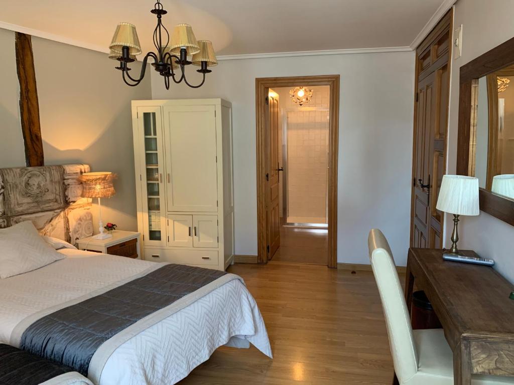 Posteľ alebo postele v izbe v ubytovaní Hostal El Resbalon
