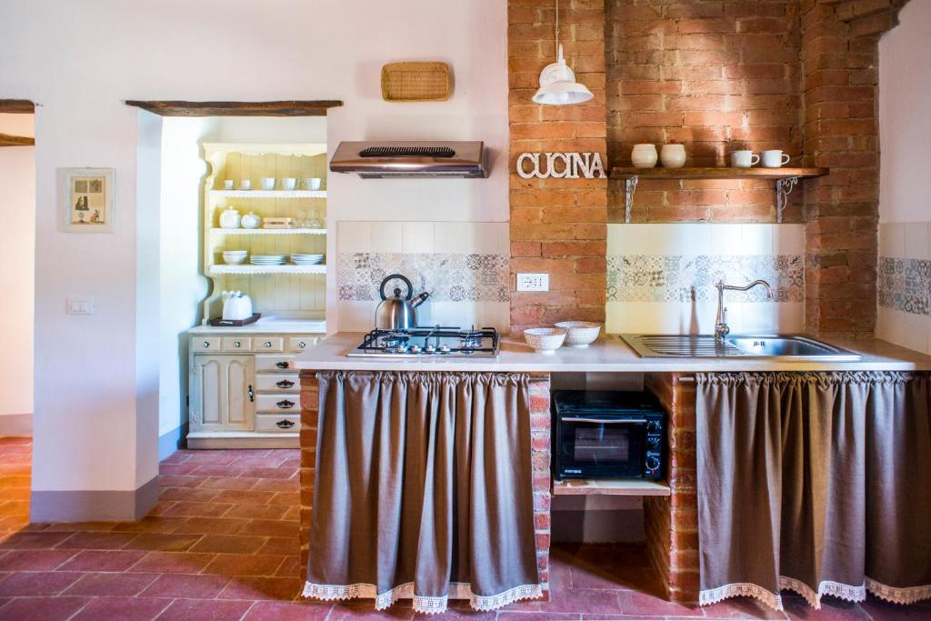 Kuchyň nebo kuchyňský kout v ubytování Agriturismo Pieve Sprenna