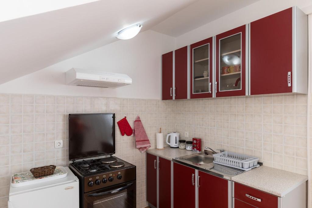 Kuchyňa alebo kuchynka v ubytovaní Red Wine Apartments