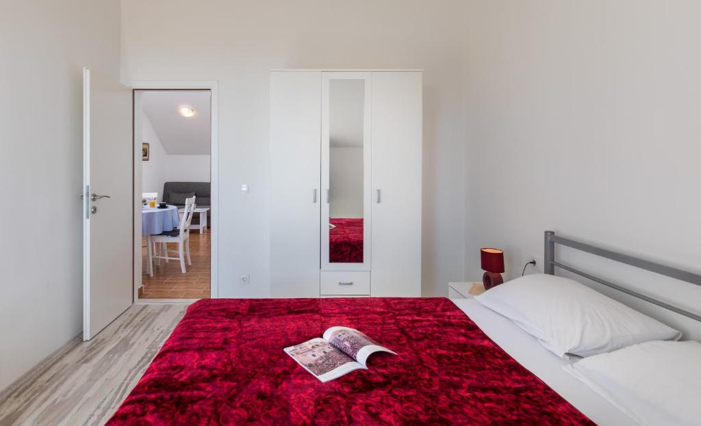 Posteľ alebo postele v izbe v ubytovaní Red Wine Apartments