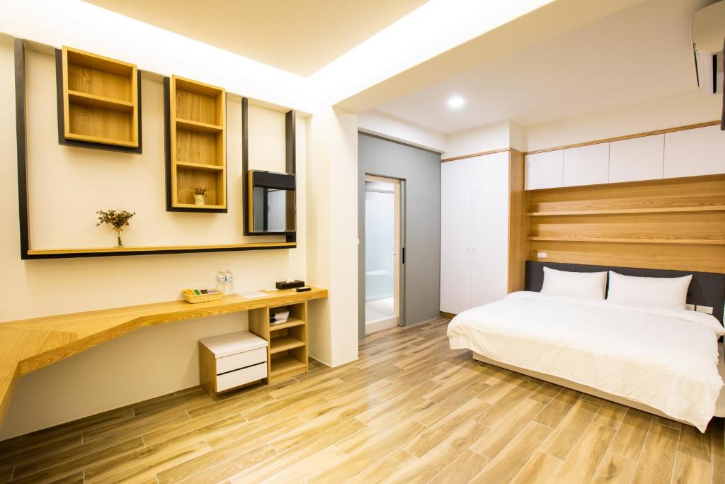 Postel nebo postele na pokoji v ubytování Araucaria Residence