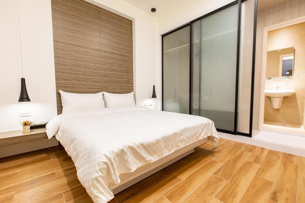 Postel nebo postele na pokoji v ubytování Araucaria Residence